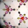 Kaleidoszkóp - régi játékok motívummal 4,5 cm átmérővel Kaleidoszkóp - régi játékok motívummal 4,5 cm átmérővel