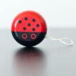 Wooden yo-yo with Ladybird motive