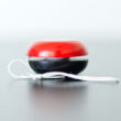 Wooden yo-yo with Ladybird motive