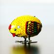 Picking chick  vintage tin toy