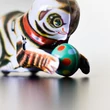 Rolling cat with ball tin toy