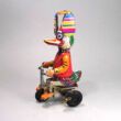 Duck on tricycle tin toy
