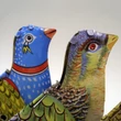 Whisting bird tin toy