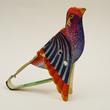 Whisting bird tin toy