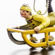 Sledging boy - tin toy Sledging boy - tin toy