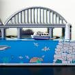 Sea bridge tin toy with ships Sea bridge tin toy with ships