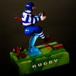 Blue Rugby player tin toy