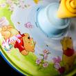 Humming top with Winnie the Pooh grafic 13cm Humming top with Winnie the Pooh grafic 13cm