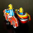Small Sidecar tin toy with passanger