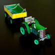 Green Tractor with trailer tin toy