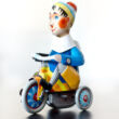 Boy on tricycle tin toy