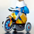 Boy on tricycle tin toy