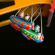 Small Swing-boat tin toy