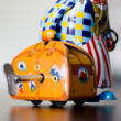 Bear with suitcase tin toy