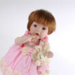 Porcellain doll in pink dress with Bunny 35cm