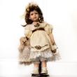 VIKTÓRIA porcelánbaba krémszínű selyemruhában 58 cm VIKTÓRIA porcelánbaba krémszínű selyemruhában 58 cm