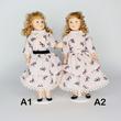 Kecses porcelánbaba különféle ruhákban 22 cm Kecses porcelánbaba különféle ruhákban 22 cm