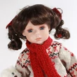 LORA porcelánbaba mackóval 46cm LORA porcelánbaba mackóval 46cm