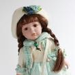 DÓRA porcelánbaba H= 30cm DÓRA porcelánbaba H= 30cm