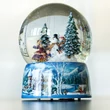 Winter scene with snow, lights and music in a snow globe - Merry Christmas