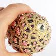 Rózsás Fabergé tojás zenélő ékszertartó Rózsás Fabergé tojás zenélő ékszertartó