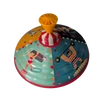 Spinning top with circus graphics - tin toy