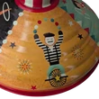 Spinning top with circus graphics - tin toy