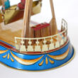 Swing-boat facsimile tin toy