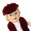 Zenélő, táncoló porcelán fiúbaba 42cm- kék ruhában Zenélő, táncoló porcelán fiúbaba 42cm- kék ruhában