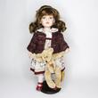 EMMA porcelánbaba mackóval 47cm EMMA porcelánbaba mackóval 47cm