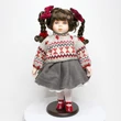 CSILLA - porcelánbaba fehér mackóval 36cm CSILLA - porcelánbaba fehér mackóval 36cm